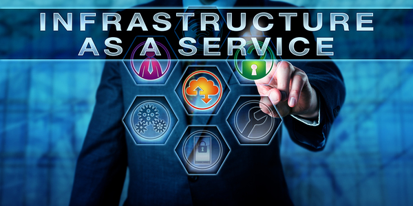 Man with a digitally created graphic with the words Infrastructure as a service.