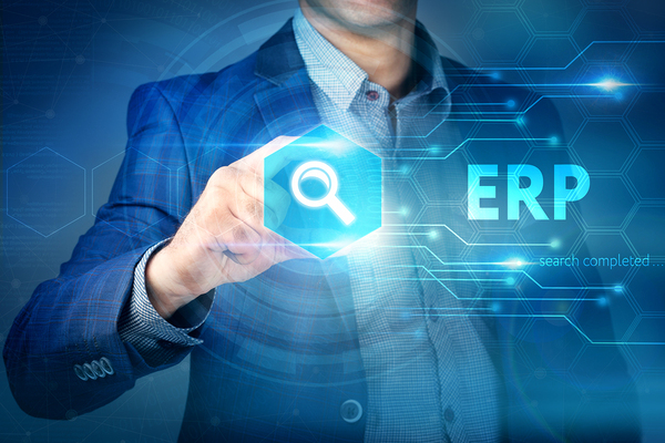 Man pointing to a search icon with the letters ERP next to it.