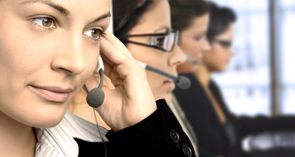 Group of people wearing headsets.